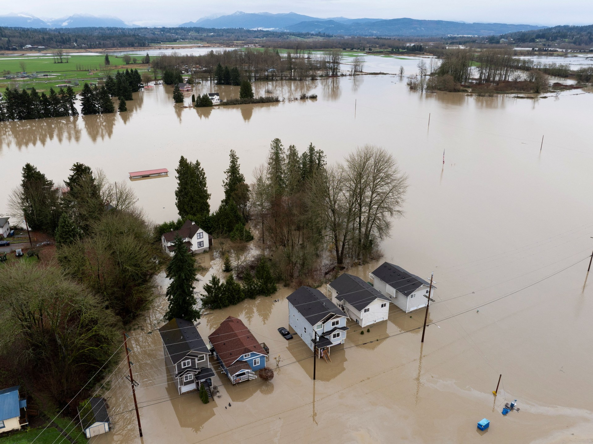 ‘Catastrophic flooding’ lingers in Pacific Northwest as heavy rains ease 