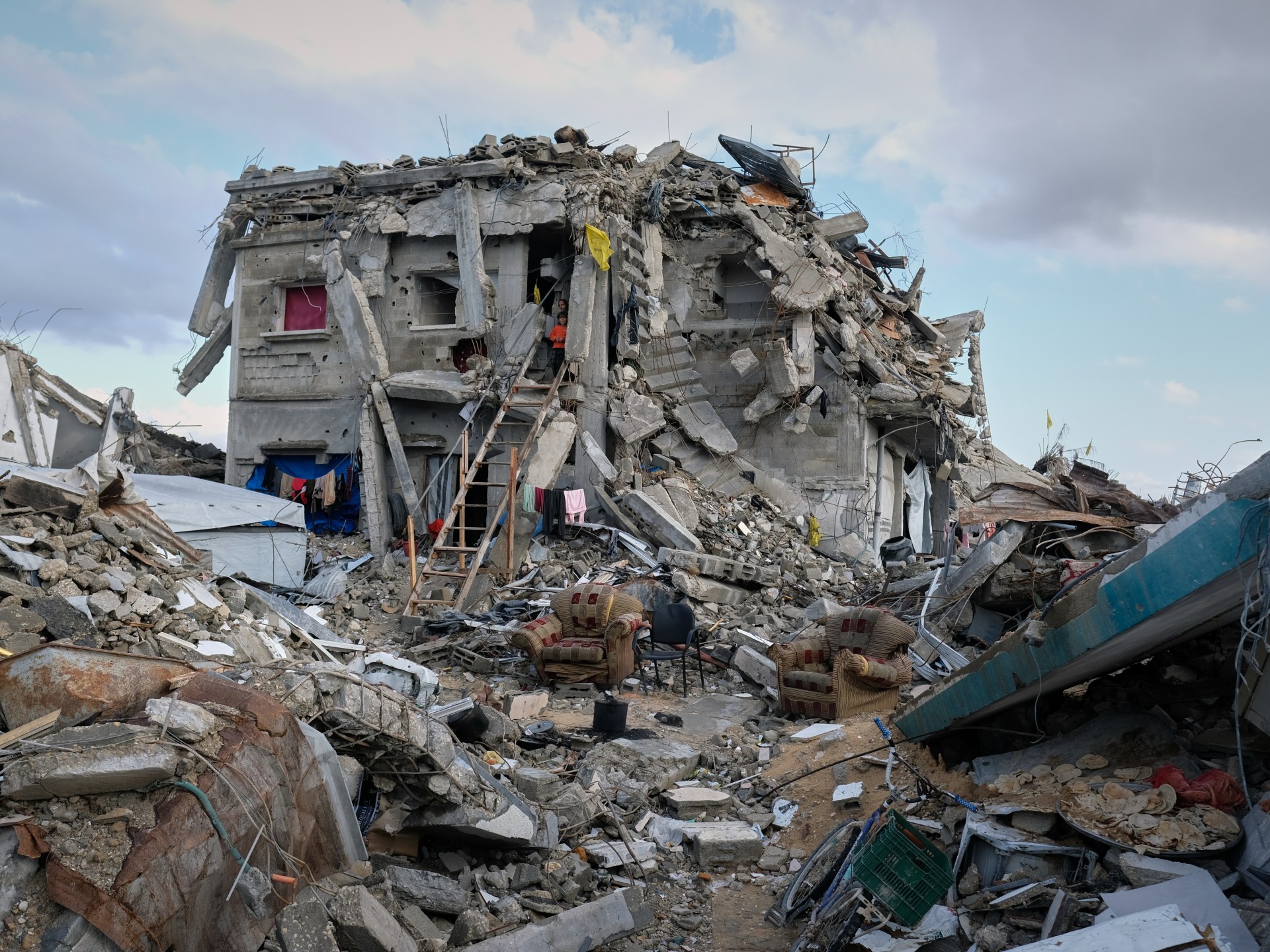 Photos: Gaza buildings bombed by Israel become refuge for Palestinians 