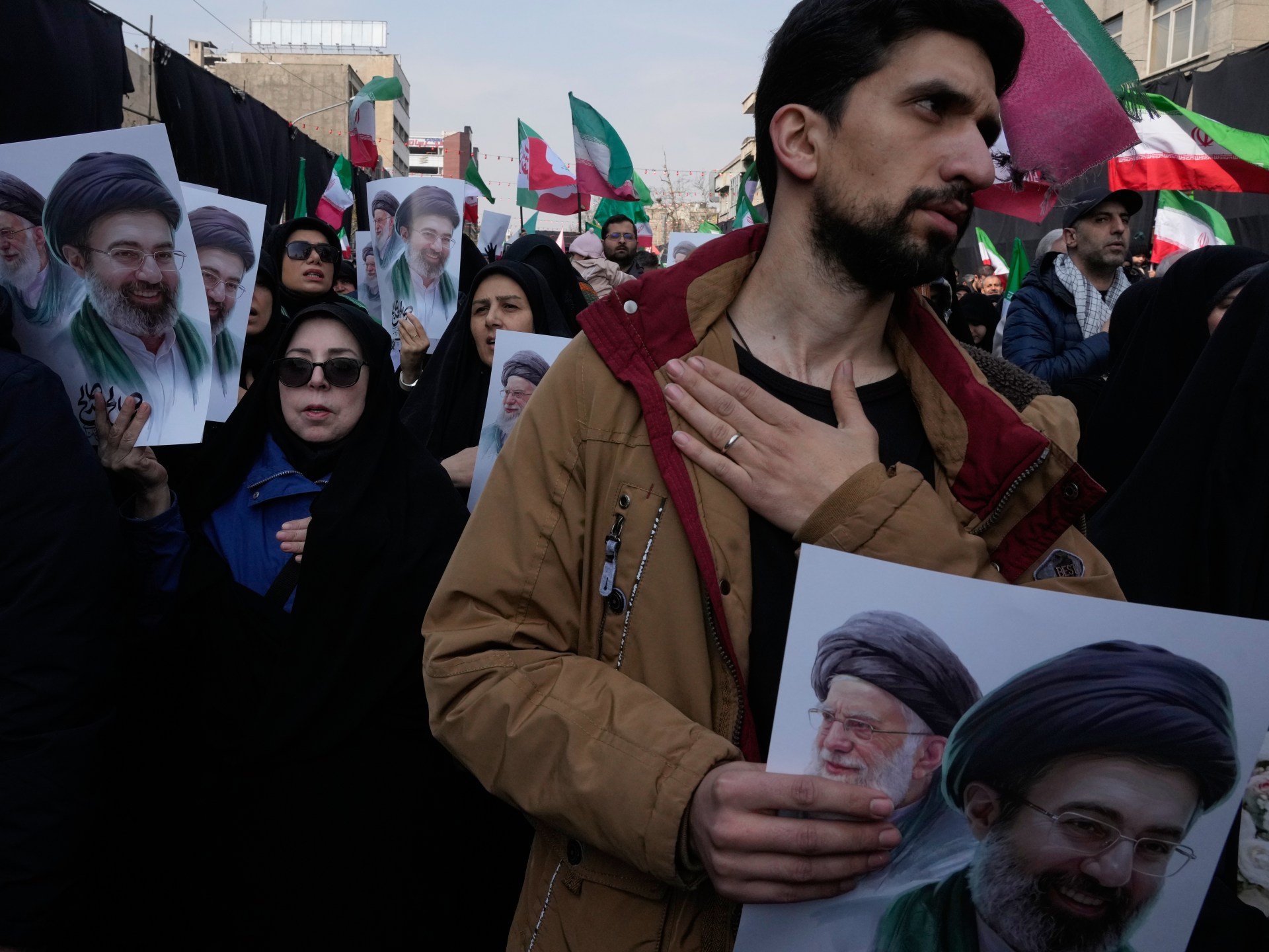 Iran’s authorities warn against protests as Israel threatens Basij forces 